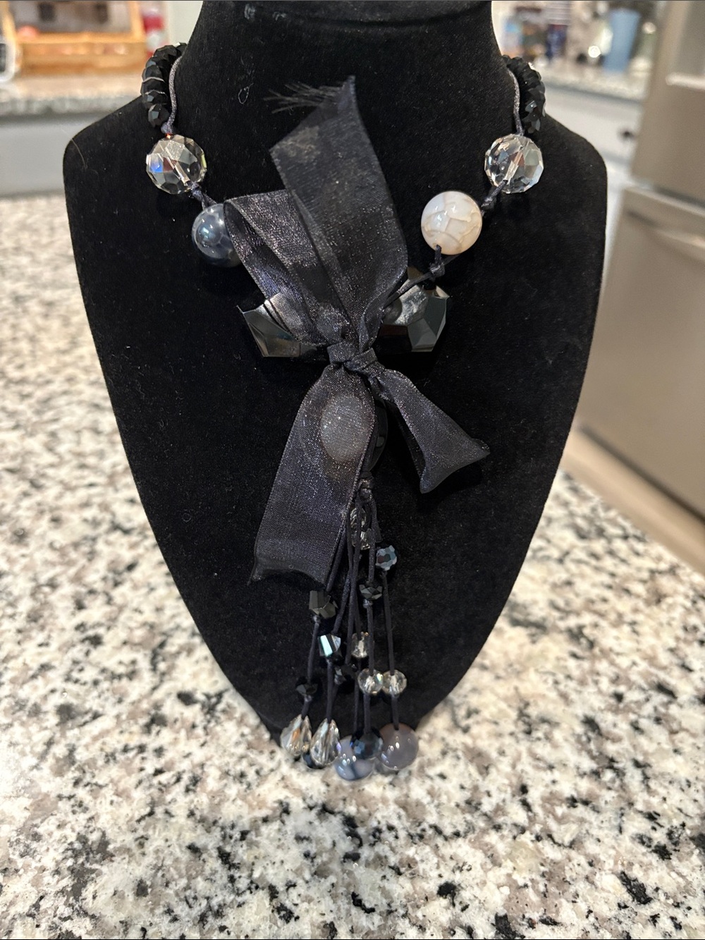 Elegant Black Beaded Pendant Necklace with Ribbon Accent